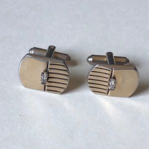 Gold colored cuff links